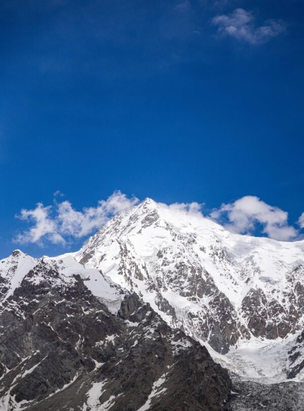 Close-up of Nanga Parbat summit at 8,126m, the world's ninth highest mountain, against a deep blue sky, Fairy Meadows