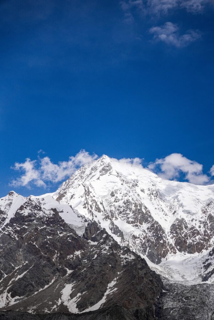 Close-up of Nanga Parbat summit at 8,126m, the world's ninth highest mountain, against a deep blue sky, Fairy Meadows