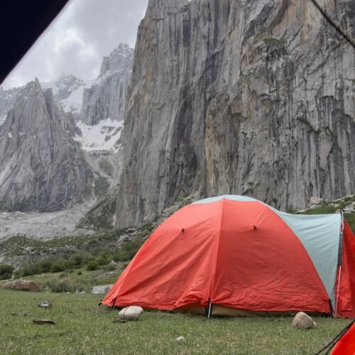 The view from a trekking campsite in Nangma Valley, Skardu, Pakistan, looking out at the sheer granite walls that make this valley a world class rock climbing destination in the Karakoram range.